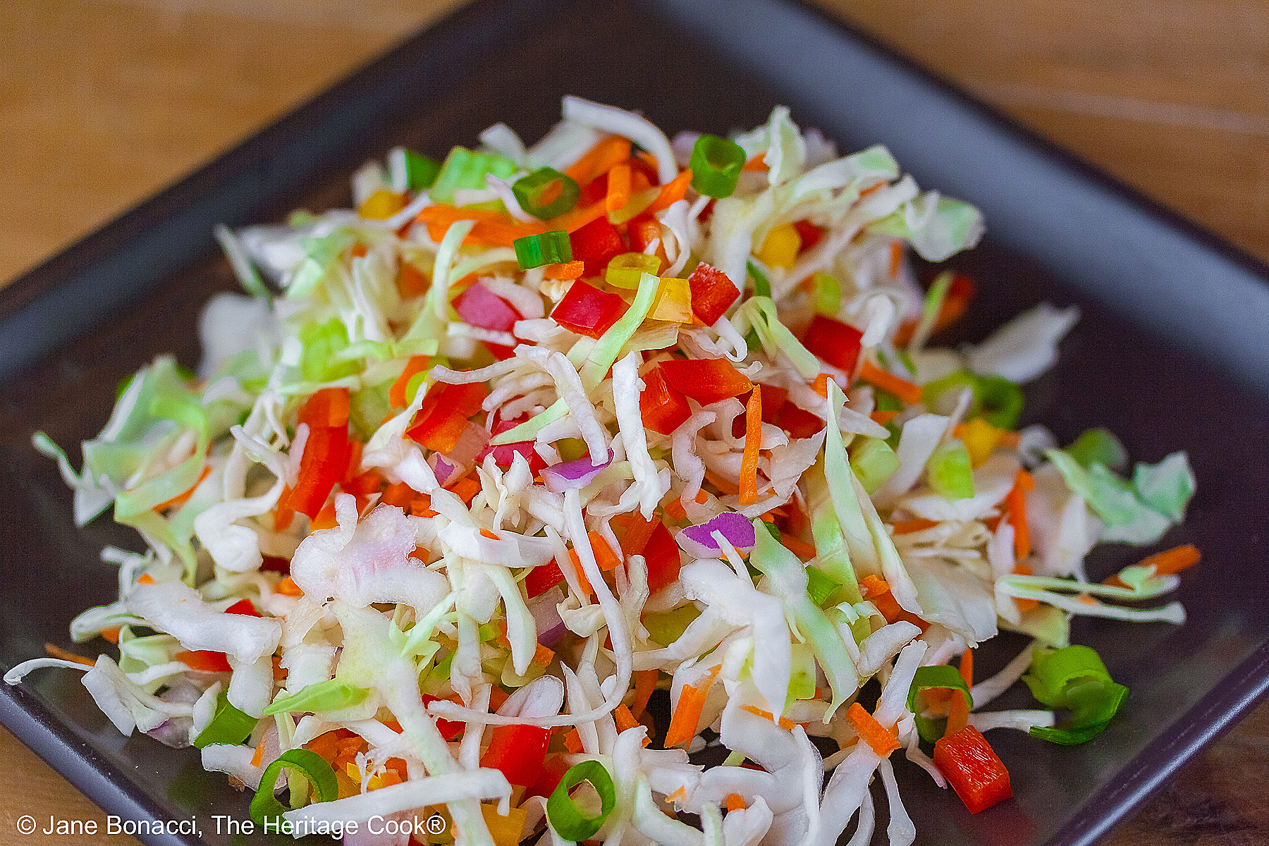 Variations in Coleslaw, Make it Your Own! A base slaw recipe to start with, then suggested vegetable additions and choice of three dressings to customize your coleslaw to your liking! © 2026 Jane Bonacci, The Heritage Cook.