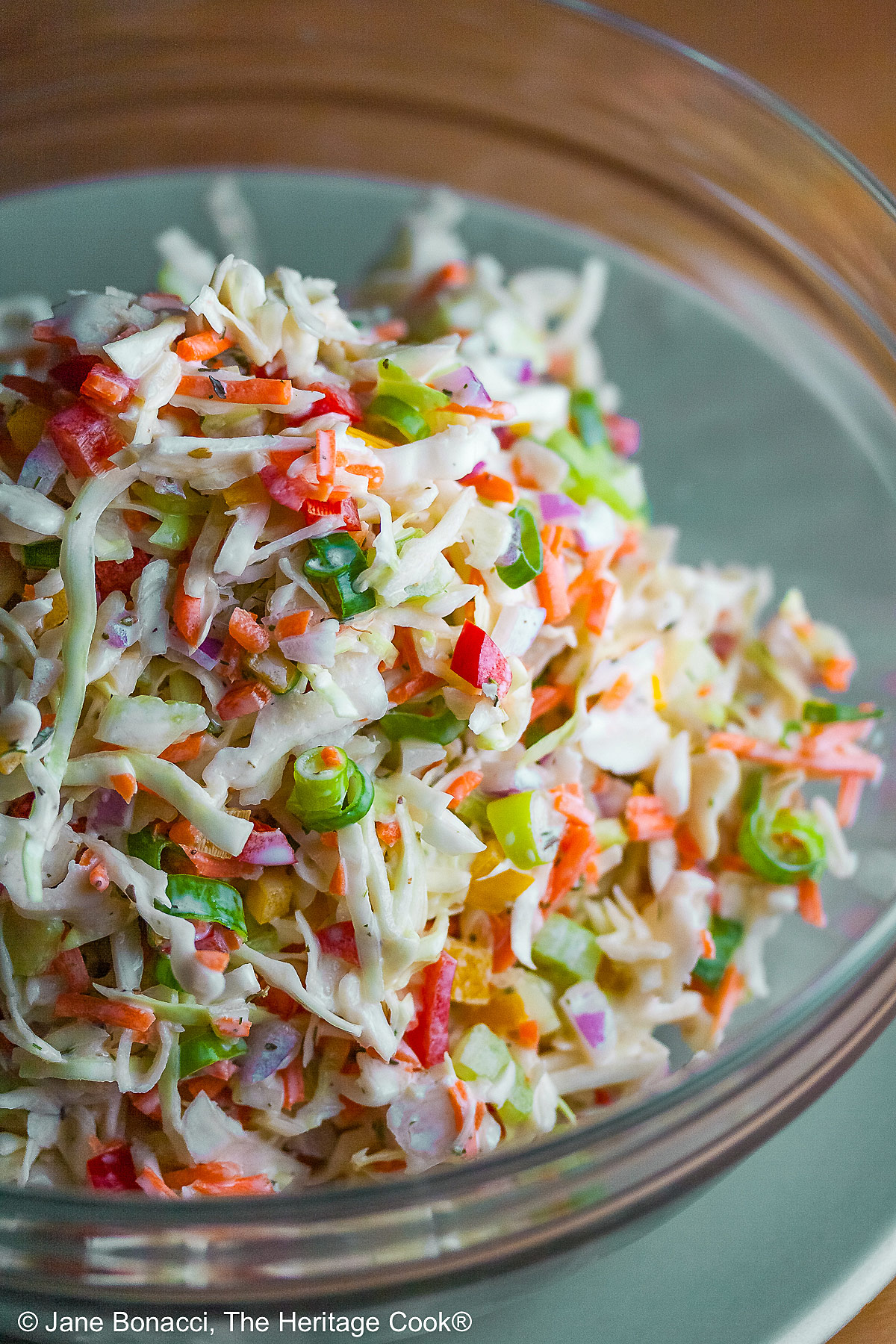 Variations in Coleslaw, Make it Your Own! A base slaw recipe to start with, then suggested vegetable additions and choice of three dressings to customize your coleslaw to your liking! © 2026 Jane Bonacci, The Heritage Cook.