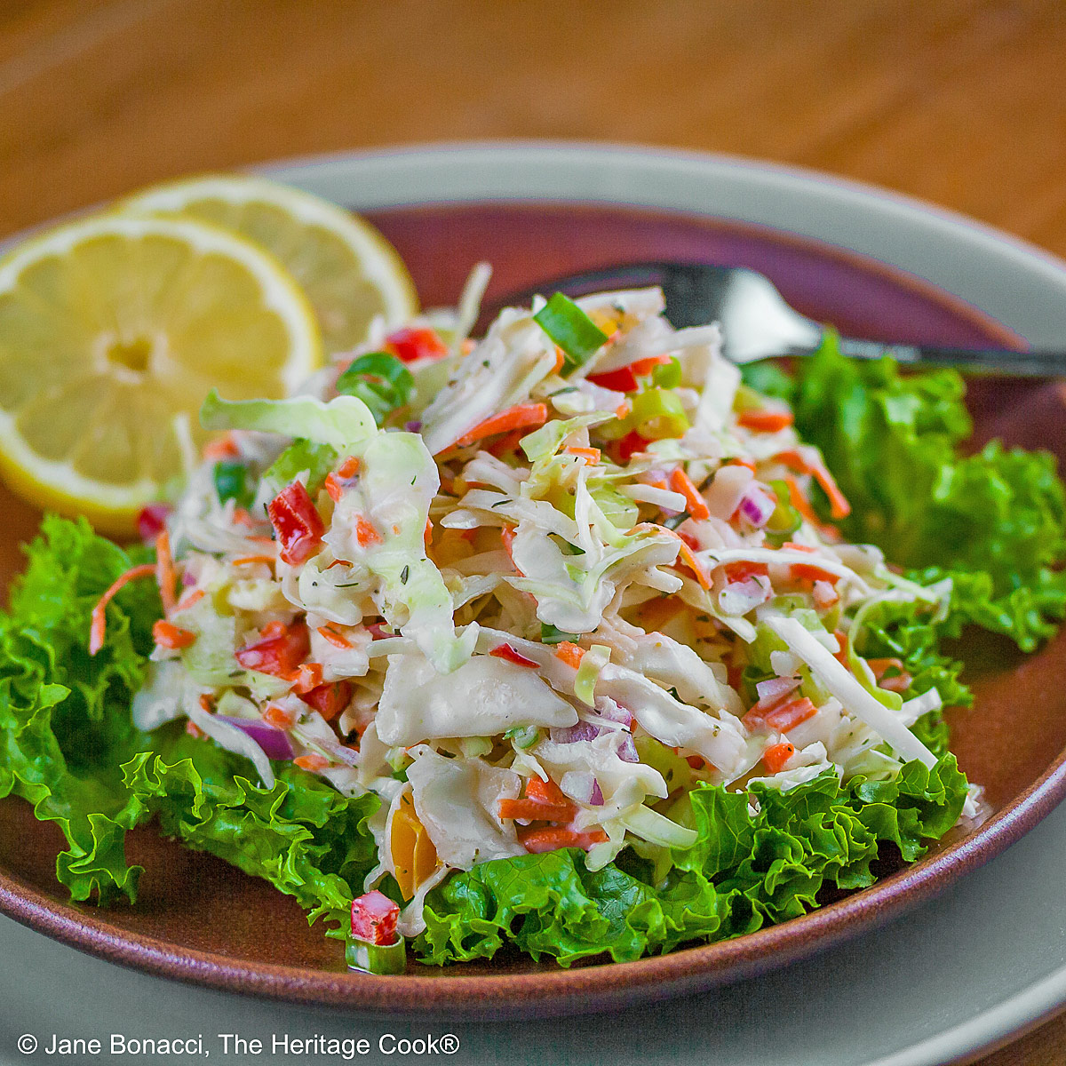 Variations in Coleslaw, Make it Your Own! A base slaw recipe to start with, then suggested vegetable additions and choice of three dressings to customize your coleslaw to your liking! © 2026 Jane Bonacci, The Heritage Cook.
