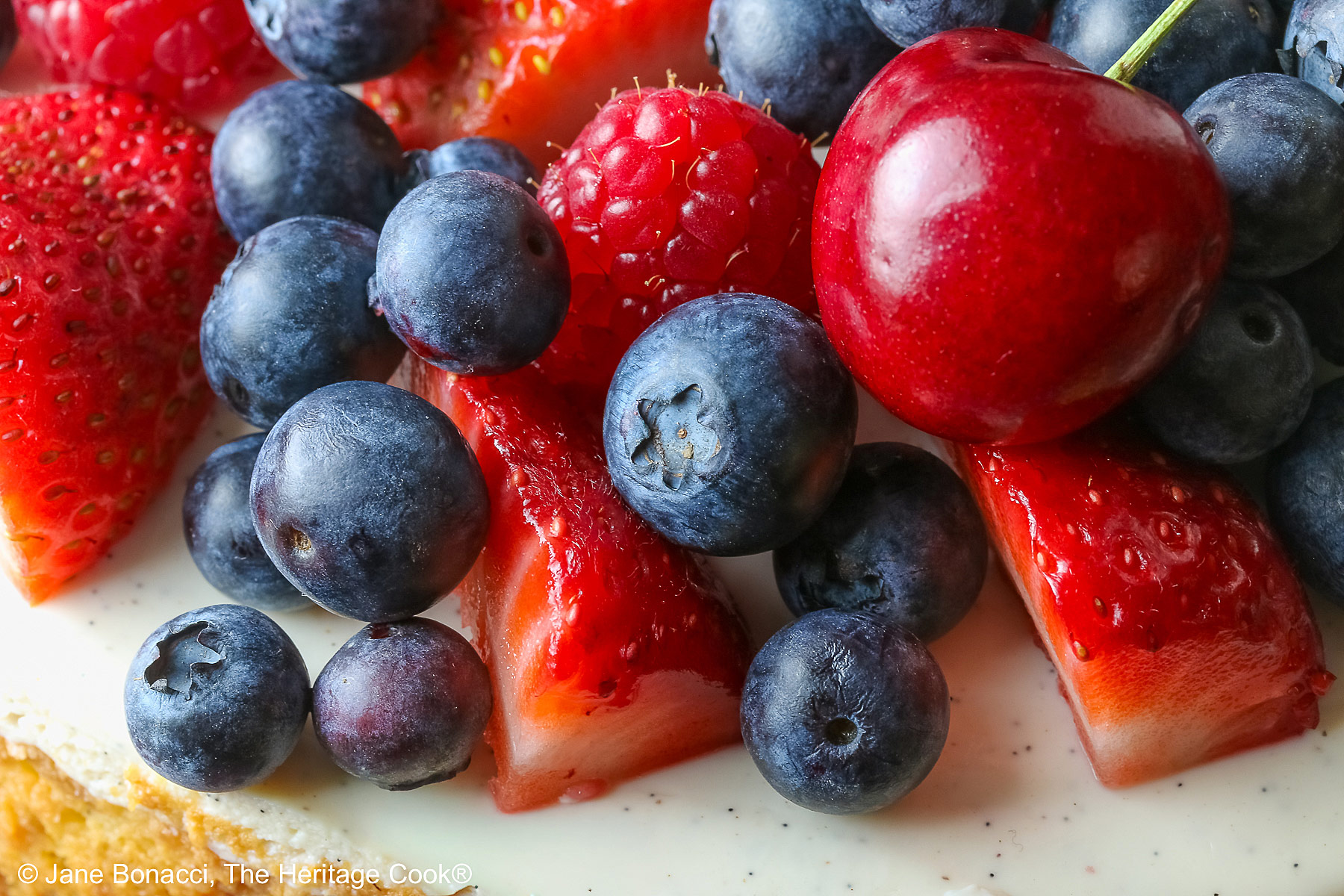 Close up of the pile of fresh and beautiful red and blue fruits.