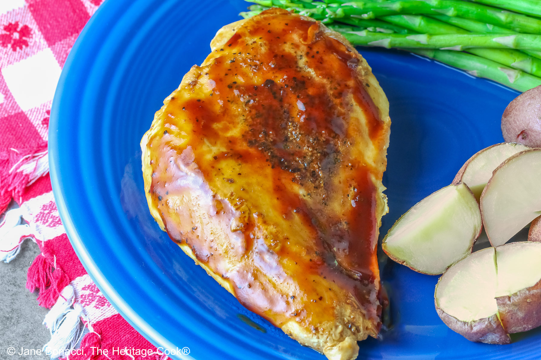 Close up shot of the chicken slathered with the root beer BBQ sauce.