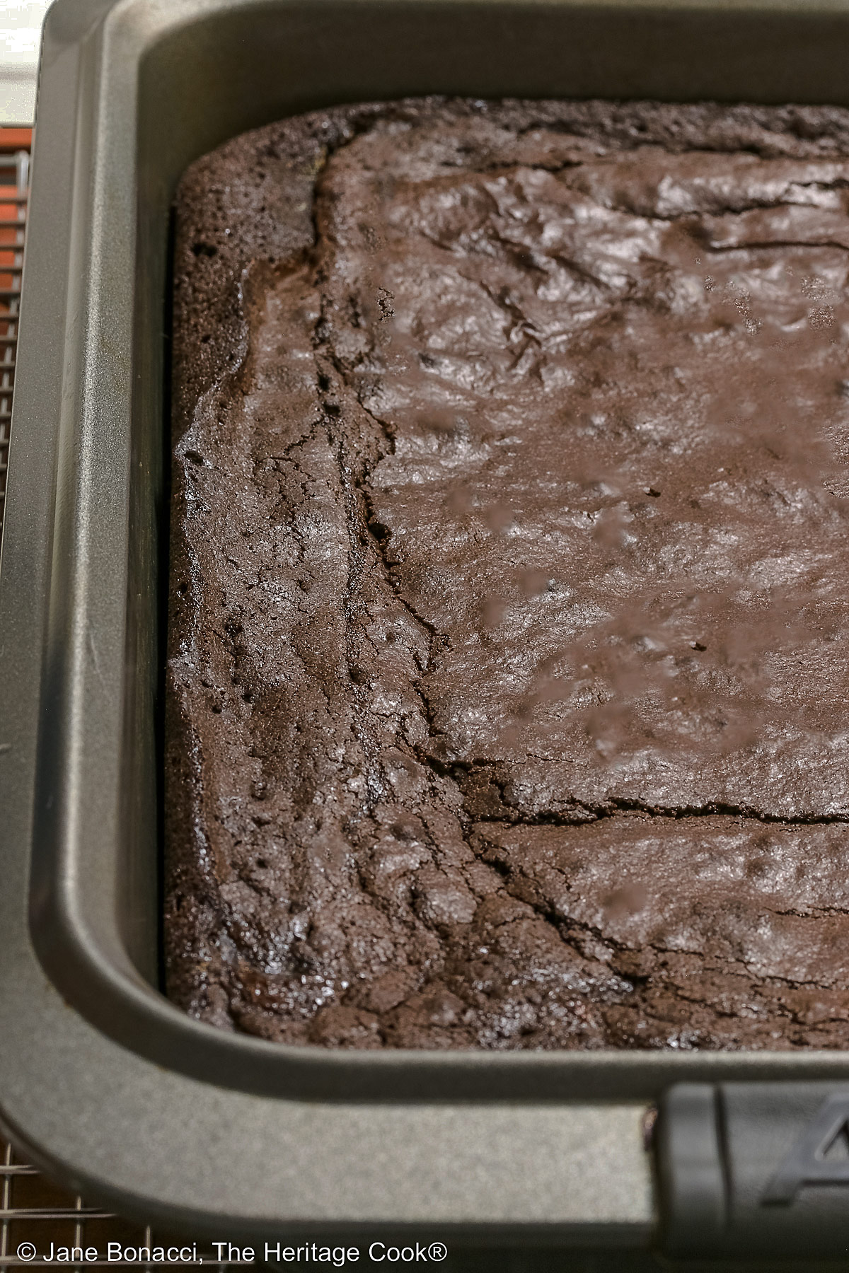 The baked fudgy brownie layer ready for toppings.