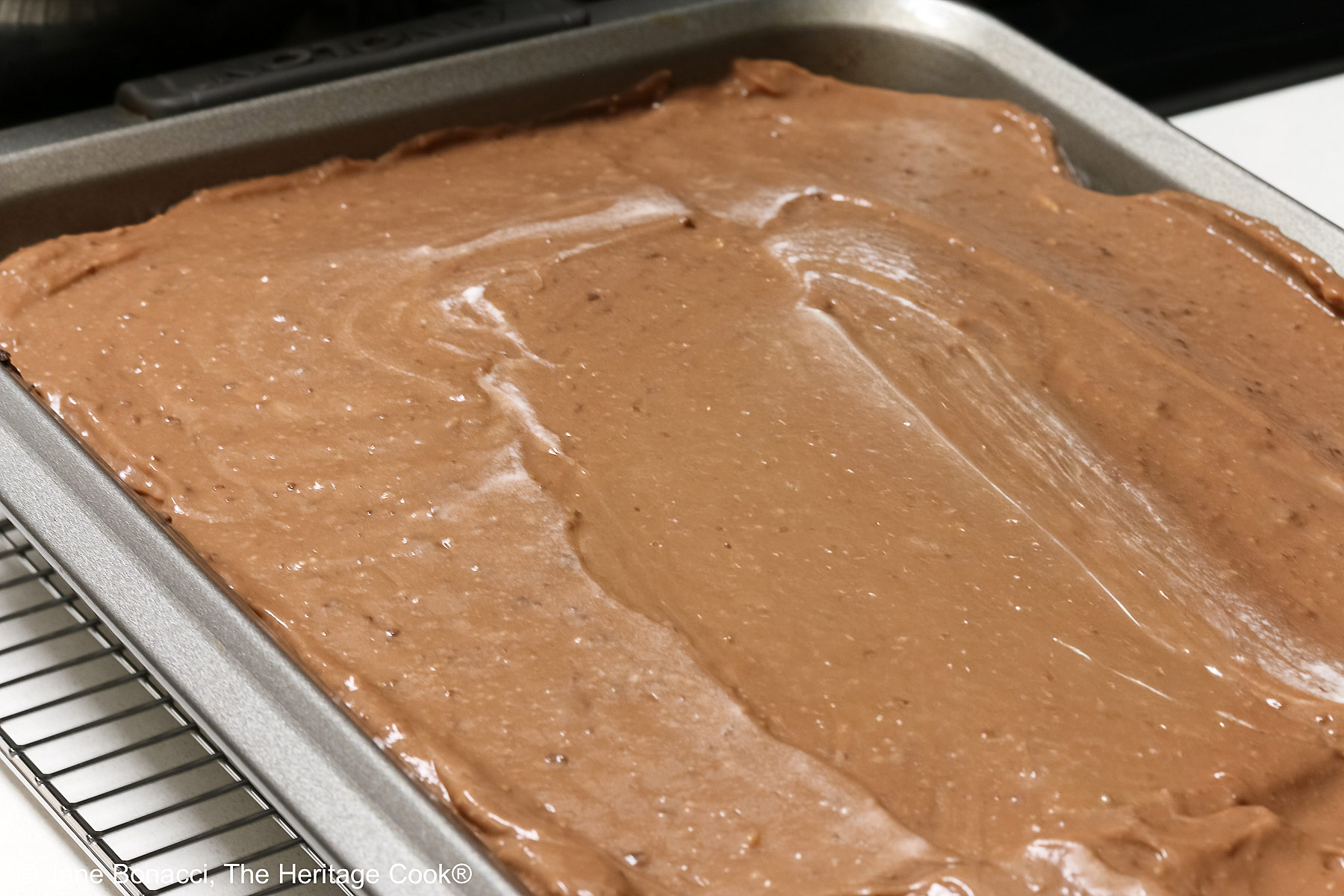 The pudding mixture spread over the top of the brownies and cream cheese layer.
