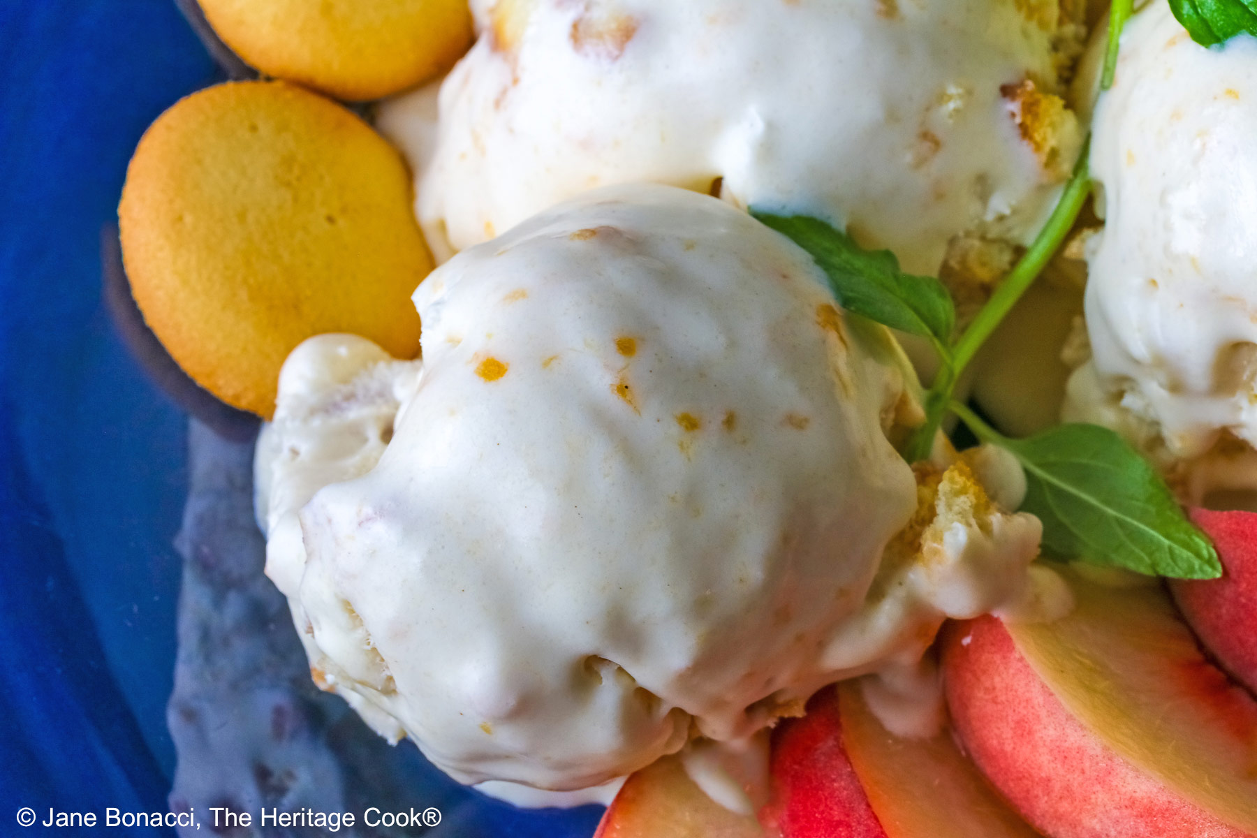 Close up of scoops of Peach Cobbler Ice Cream.
