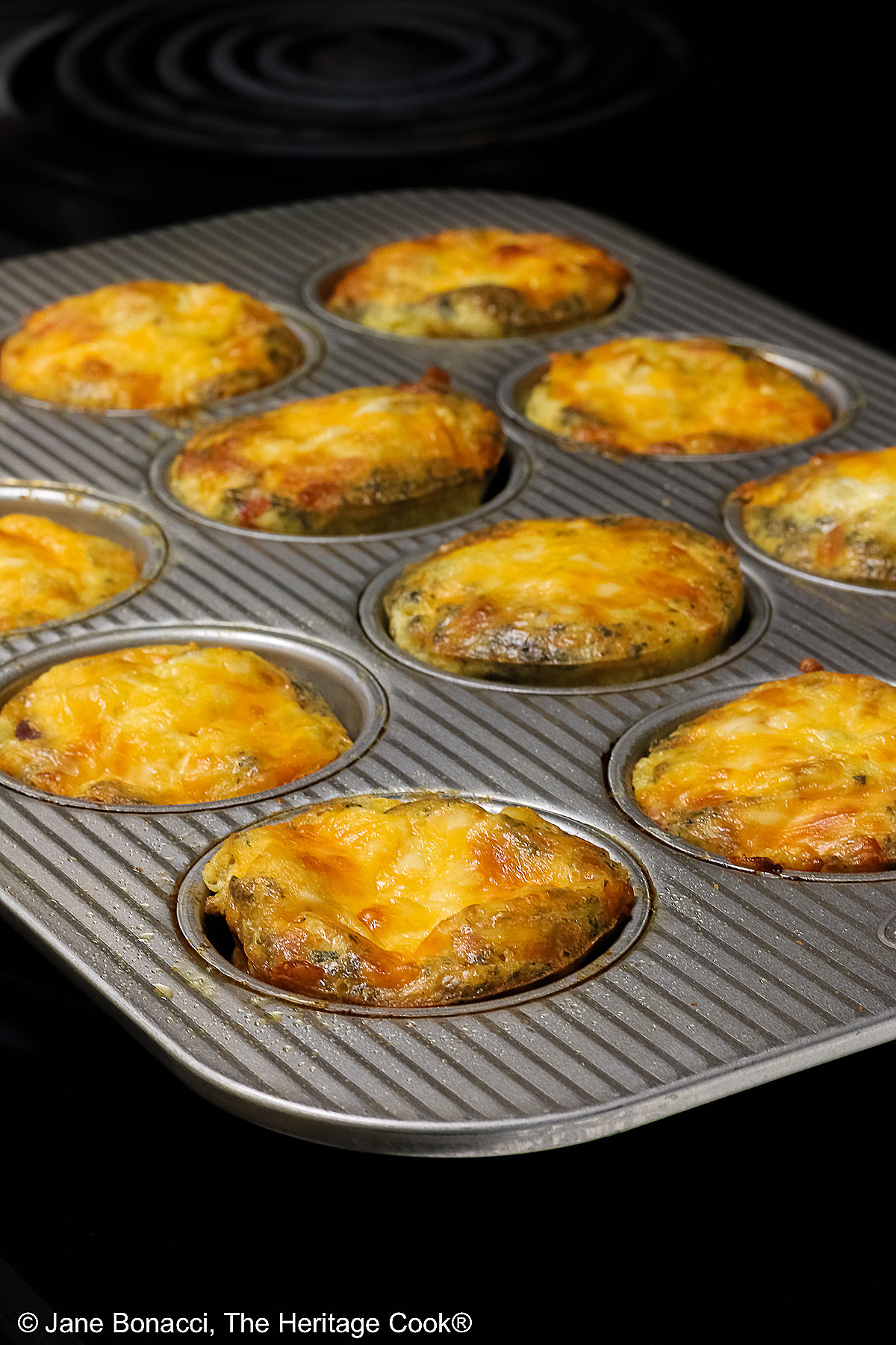 Hot from the oven, a pan of mini frittatas.